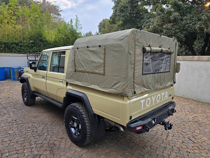 Land Cruiser 79 with an olive canvas canopy